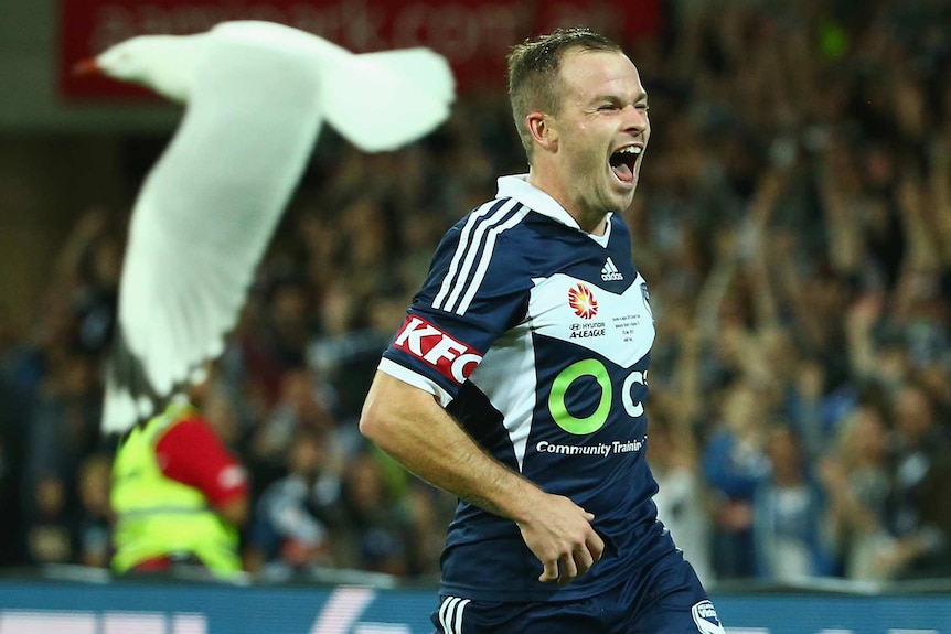 Melbourne Victory's Leigh Broxham celebrates a goal against Sydney FC in the A-League grand final.
