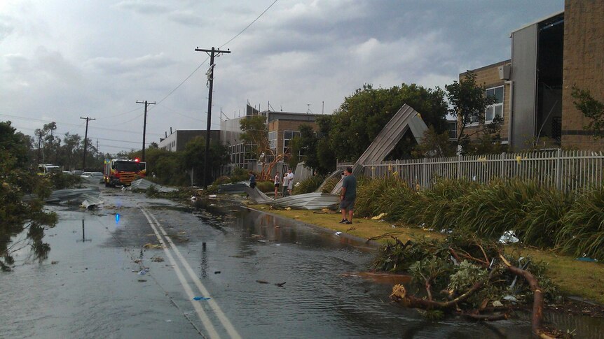 Debris lies on a street at Kurnell after a large storm hits the area.
