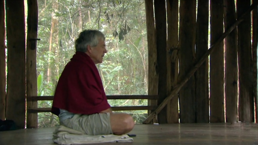 Man sits in meditation