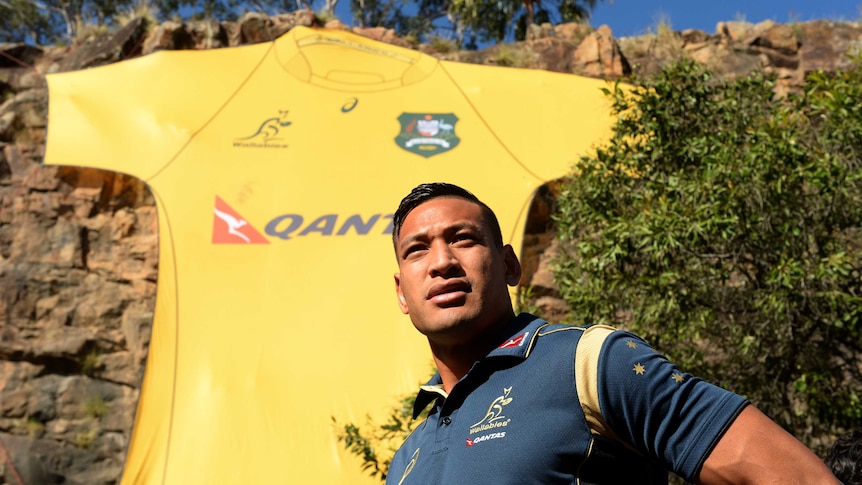 On the up ... Israel Folau poses for photographers in Brisbane