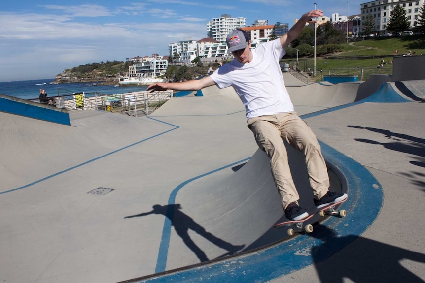 Mikey Mendoza skates off the edgy of the Bondi skate park ledge.