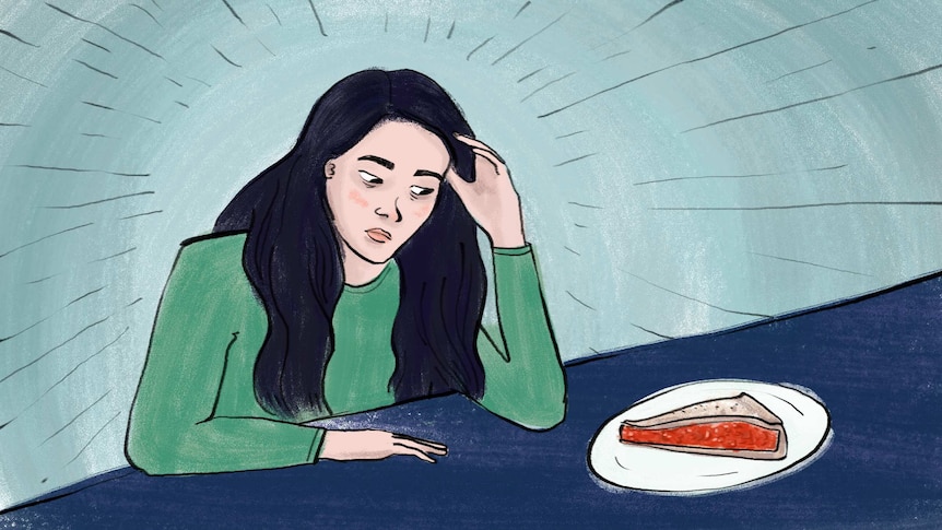 Illustration of woman sitting at a table with a piece of pie to depict the anxiety suffered by people with eating disorders.