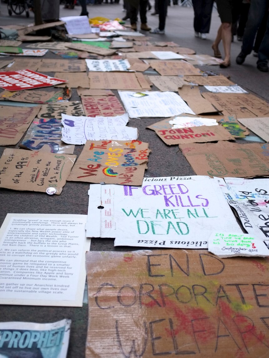 "Occupy Wall Street" protest signs in Zuccotti Park, New York