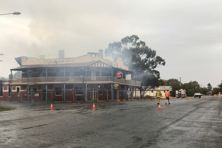 Old pub on fire before it was knocked down