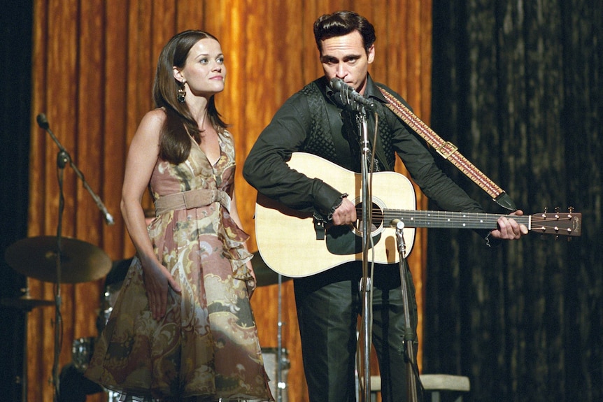 Joaquin Phoenix as Johnny Cash and Reese Witherspoon as June Carter in 2004 biopic Walk The Line