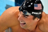 Michael Phelps of the US smiles after winning the 200m individual medley final.