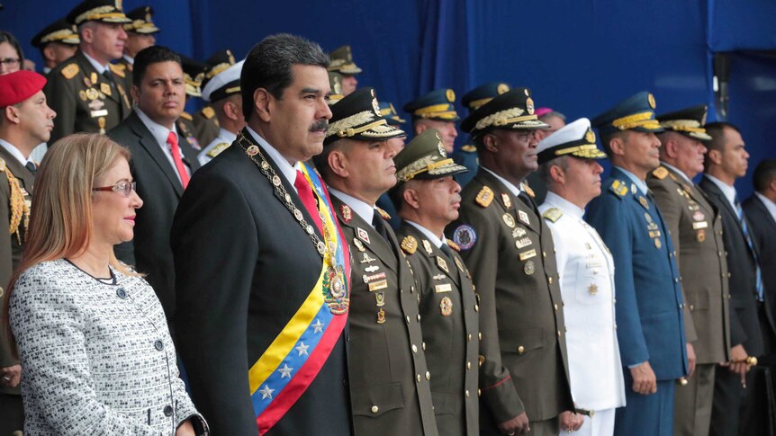 Venezuela's President Nicolas Maduro abruptly cut short his speech at a military event.