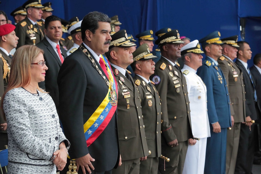 Venezuela's President Nicolas Maduro abruptly cut short his speech at a military event.