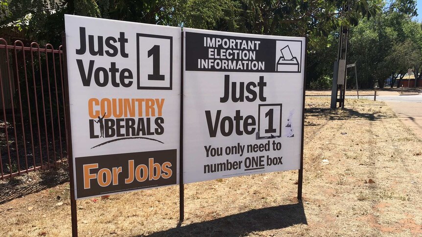 a sign saying just vote one in election font