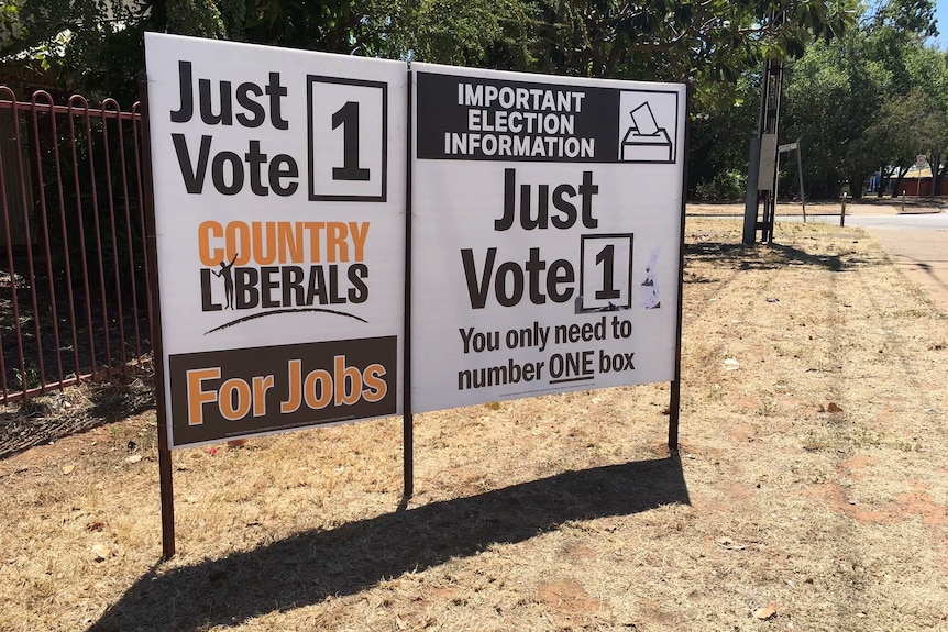 a sign saying just vote one in election font