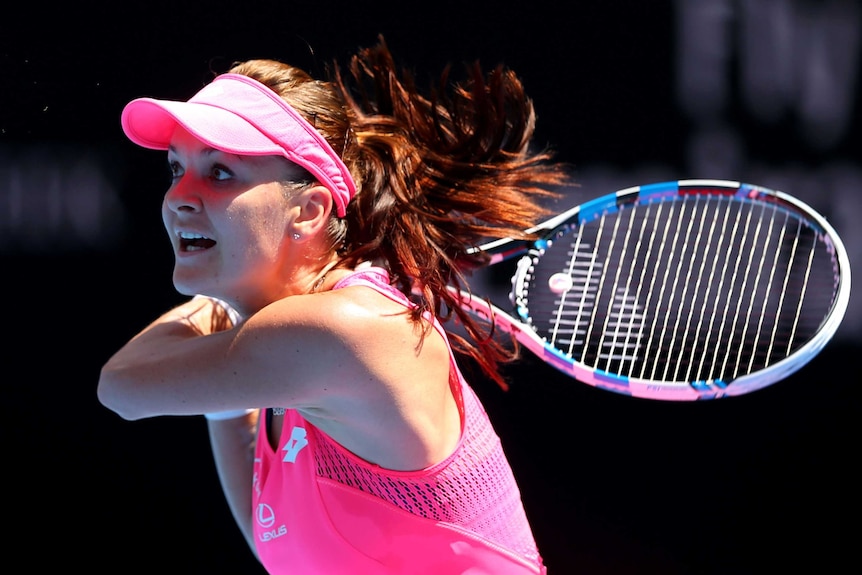 Poland's Agnieszka Radwanska plays backhand against Carla Suarez Navarro at the Australian Open.