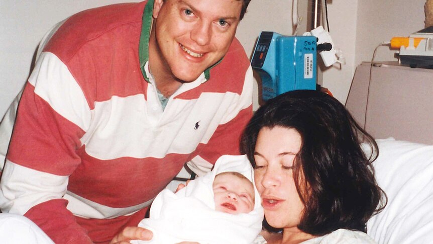 Tim Nicholls with wife Mary in hospital with firstborn son Jeremy on April 22, 1999