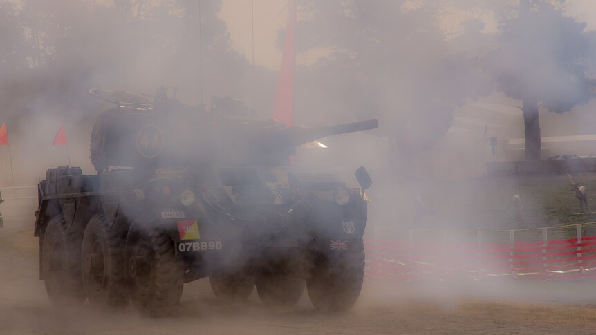 A tank obscured by smoke