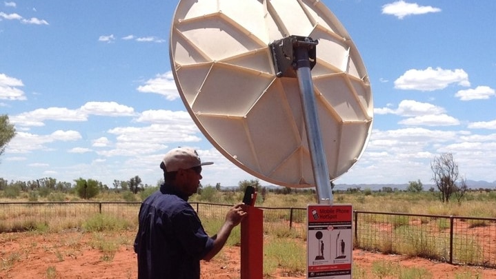 CAT employee Phil Coombes uses the hotspot along the Boggy Hole access track