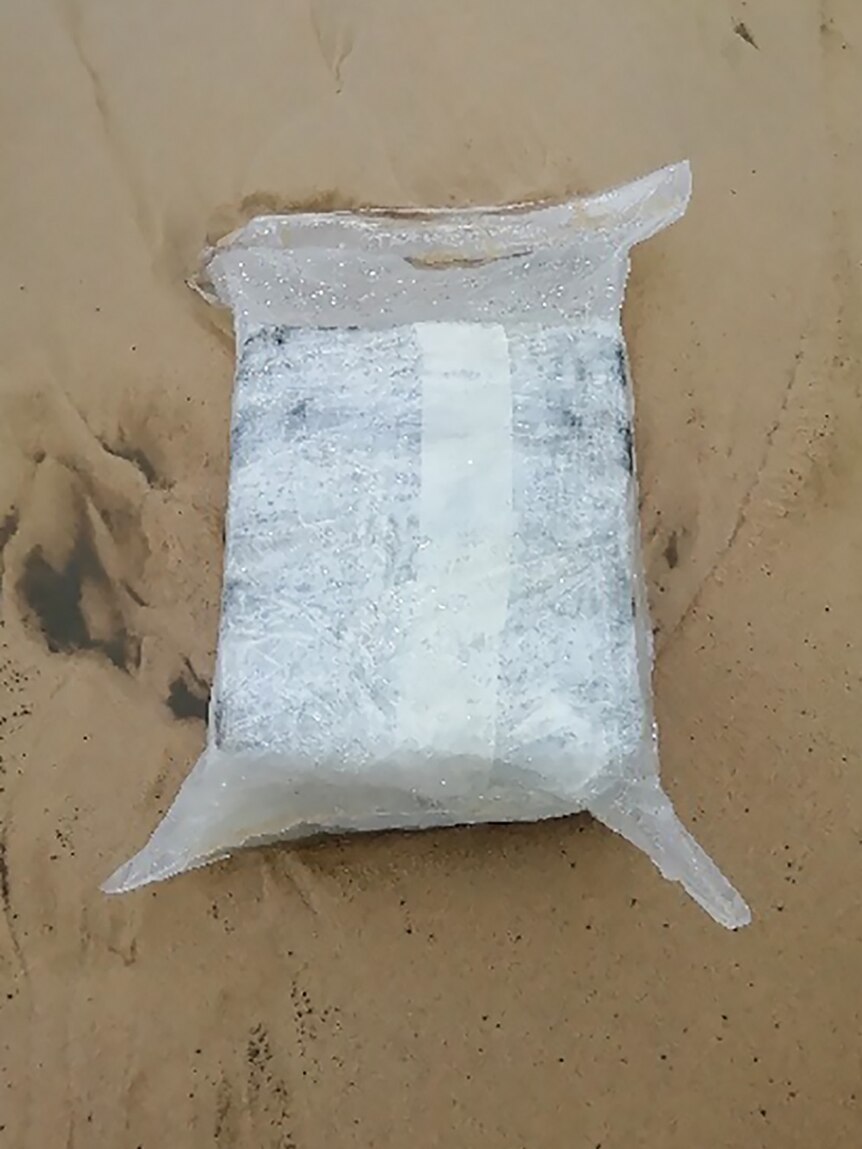 A package of cocaine washed up on the beach.