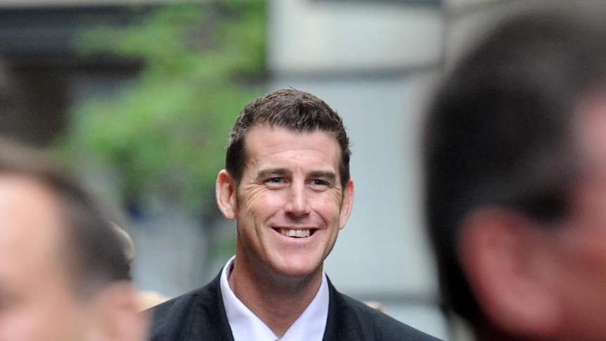 Victoria Cross recipient Ben Roberts-Smith takes part in the ANZAC Day march in Sydney (AAP: Tracey Nearmy)