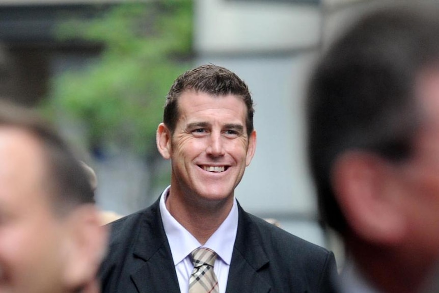 Victoria Cross recipient Ben Roberts-Smith takes part in the ANZAC Day march in Sydney