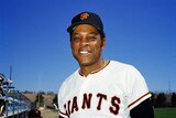 Willie Mays poses in a Giants uniform