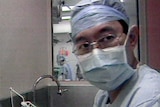 Renowned heart surgeon Victor Chang prepares for an operation