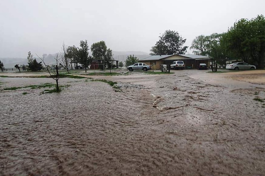 Water on ground outside house