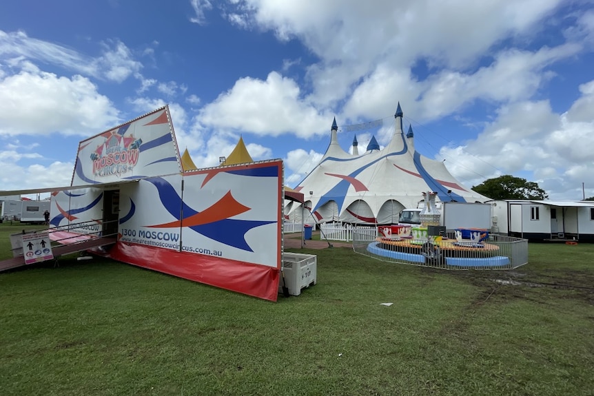 Circus tents in a green field