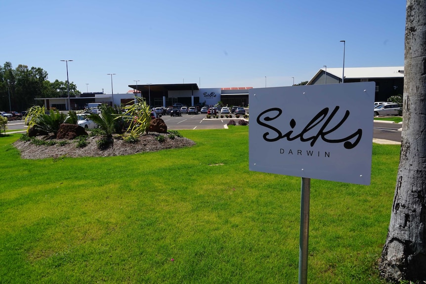 An exterior image of a sign for the Silks venue outside the Darwin Turf Club