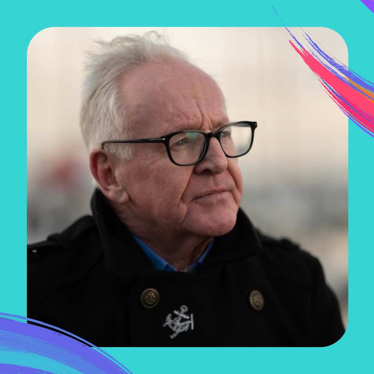 An older man with glasses looks into the distance with a thoughtful look on his face..