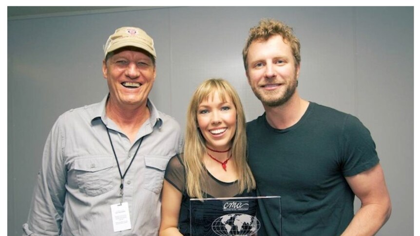 Pictured left Rob Potts, Felicity Urquhart in the centre and Dierks Bentley on the right
