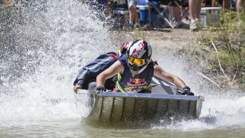 Competitors race in the 2015 Dinghy Derby leaving water spray in their wake
