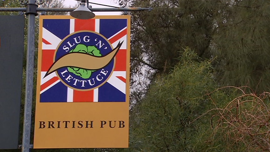 A brown sign out the front of the Slug 'n' Lettuce pub in Adelaide