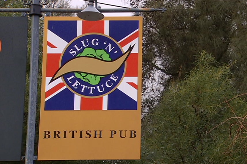A brown sign out the front of the Slug 'n' Lettuce pub in Adelaide