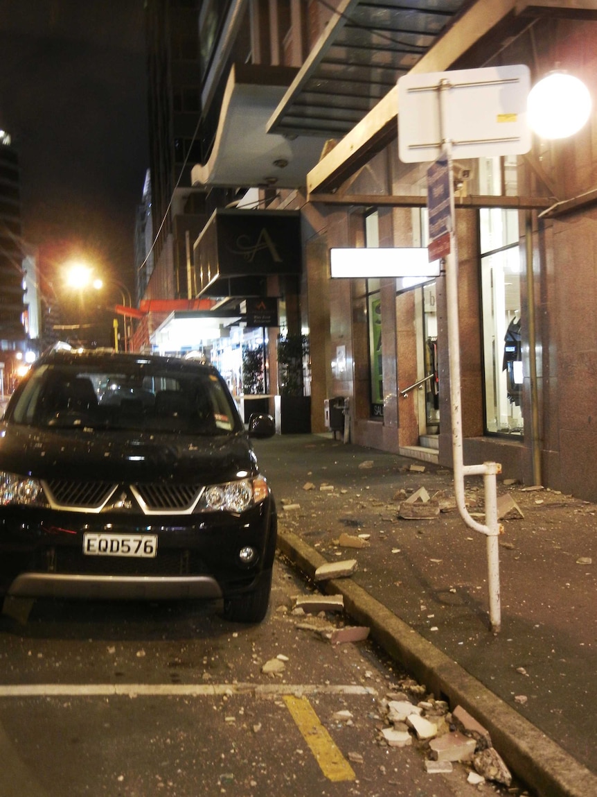 Concrete from a Featherston Street building facade came crashing down, narrowly missing a vehicle.