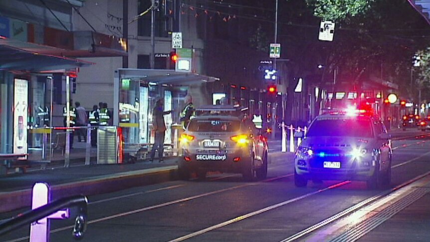 Police at the scene of a shooting in Melbourne's CBD