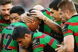 Souths players celebrate a try