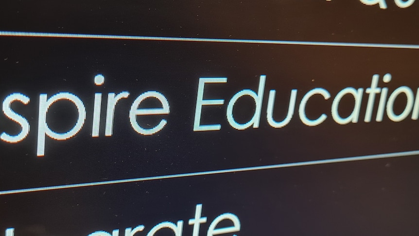 Inspire Education Pty Ltd name on board in Brisbane City office building