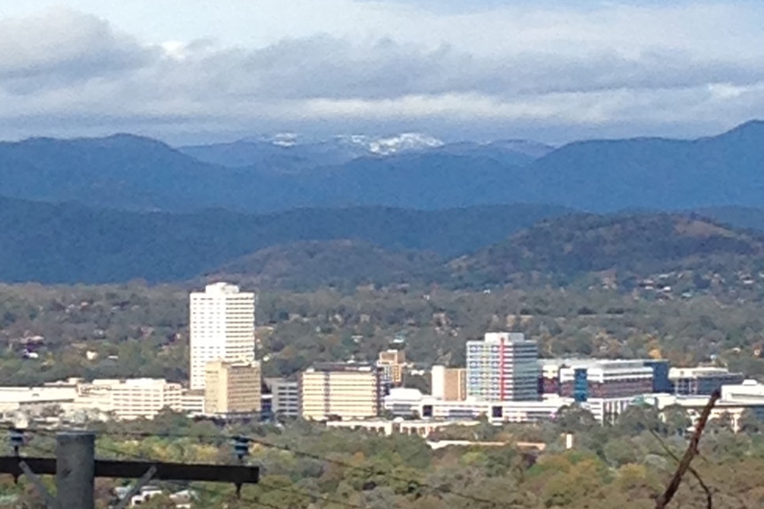 Snow on the mountains outside Canberra from Red Hill