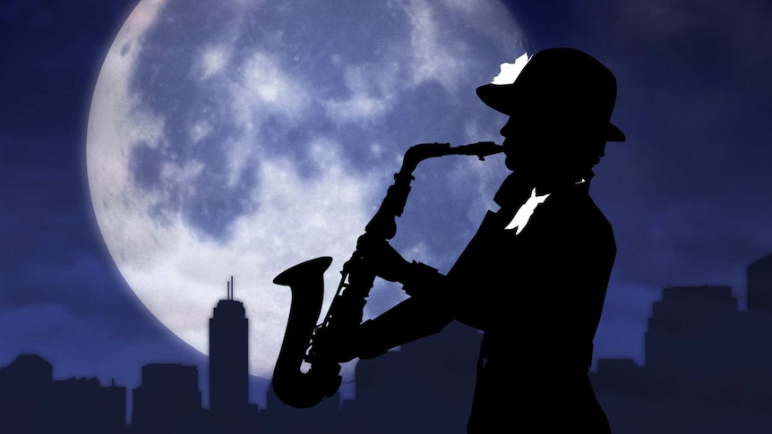 Shadow of a woman playing a saxophone against a giant moon in the night sky.