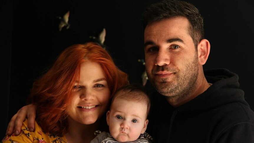 A family photo of Amy, baby Poppy and Ash Morris.