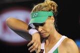 Dumped: Elena Dementieva vents frustration during her straight sets loss to Justine Henin.