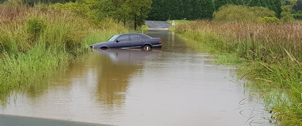A car stuck in flooded waters