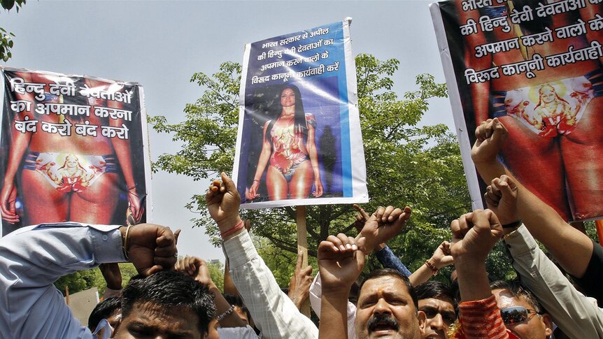 Members from hardline Hindu groups, Bajrang Dal and Vishwa Hindu Parishad (VHP), shout slogans durin