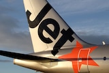 Jetstar plane,  Airbus A320 tail with orange logo