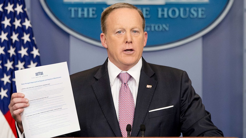Sean Spicer holds up President Donald Trump's plan to repeal Obamacare