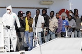 Thousands more migrants call for help in Mediterranean sea as international rescue effort gets underway