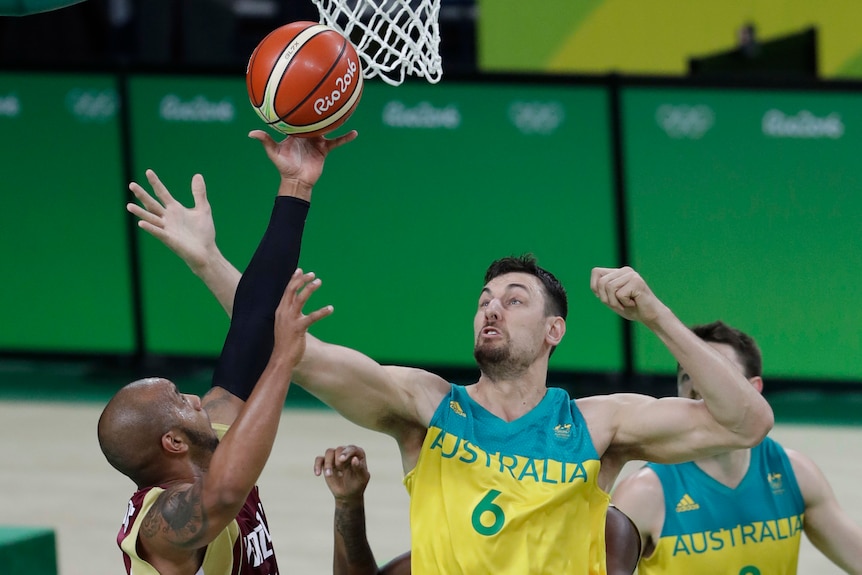 Bogut reaches for a rebound against Venezuela