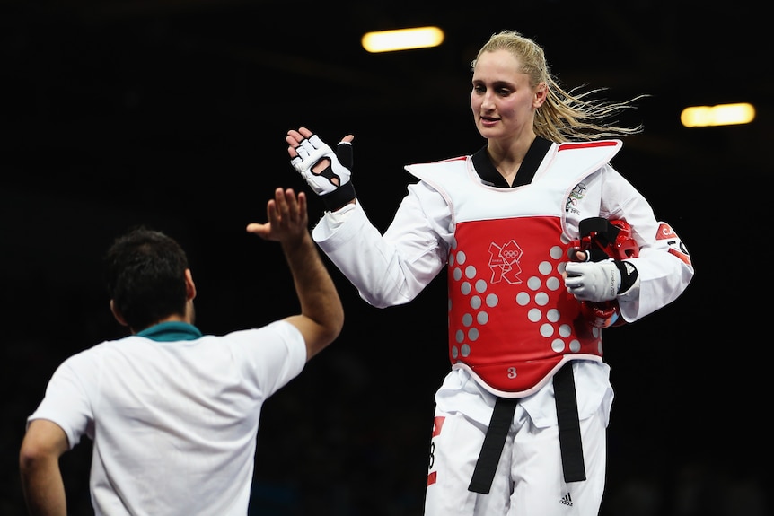 Carmen Marton celebrates taekwondo win
