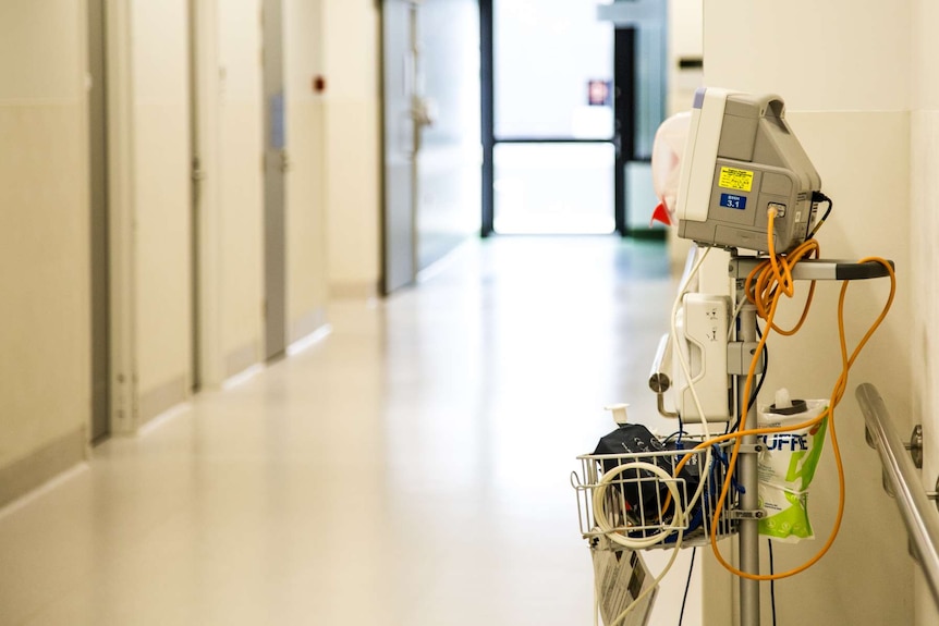A machine in an empty hospital corridor in Melbourne.