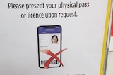 A notice at an Adelaide bottle shop advising patrons the new digital licences are not a valid form of ID.