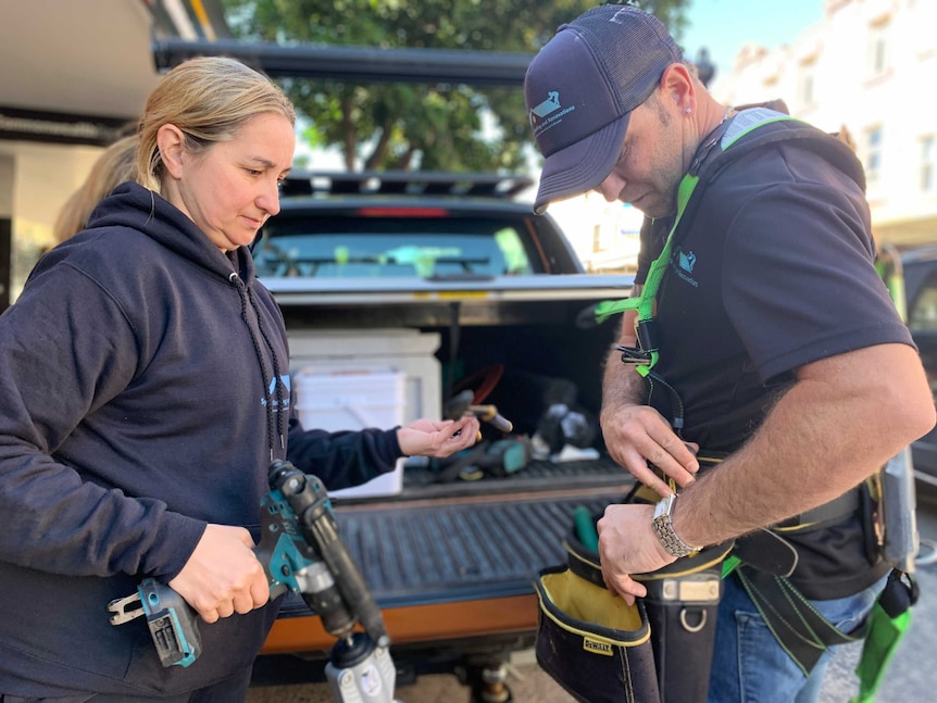 Anna Ludvik is helping out her partner, who had to let staff go from his roofing business.