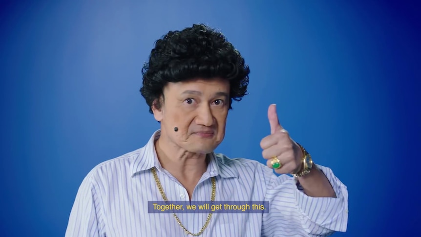 A screen grab from Singapore's vaccine ad campaign shows a man with thumbs up